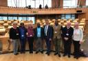 Members of the Dunblane Likhubula Partnership in the debating chamber at Scottish Parliament