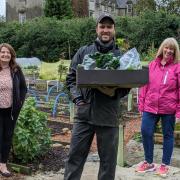 Dorothy Morrow and Yvonne Davie from Ladies of the Rock are pictured with Bannockburn House gardener Tom Gemmill