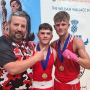 Jonesy's Boxing Club head coach James Casey with boxers Lee Welsh and Colin Cairney