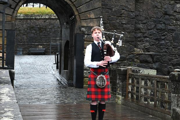Fundraising piper Max Rae teamed up with Forth Valley College students to film a New Year's Day video for Strathcarron Hospice, a cause he now raised more than £14,000 for