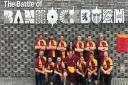 Players and volunteers from Bannockburn RFC lend a helping hand
