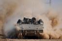 Witnesses said Israeli troops opened fire on people scrambling to get aid in Gaza (AP)
