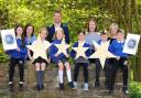 Staff from Stirling Council’s Broad General Education Team, along with pupils and the headteacher from Cambusbarron PS, celebrating Stirling Council’s Excellence in Professional Learning Award. Picture by Stirling Council/Whyler Photos.