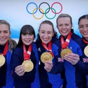Great Britain's Mili Smith, Hailey Duff, Jennifer Dodds, Vicky Wright and Eve Muirhead celebrate with the gold medal after victory in the Women's Gold Medal Game against Japan during day sixteen of the Beijing 2022 Winter Olympic Games at the